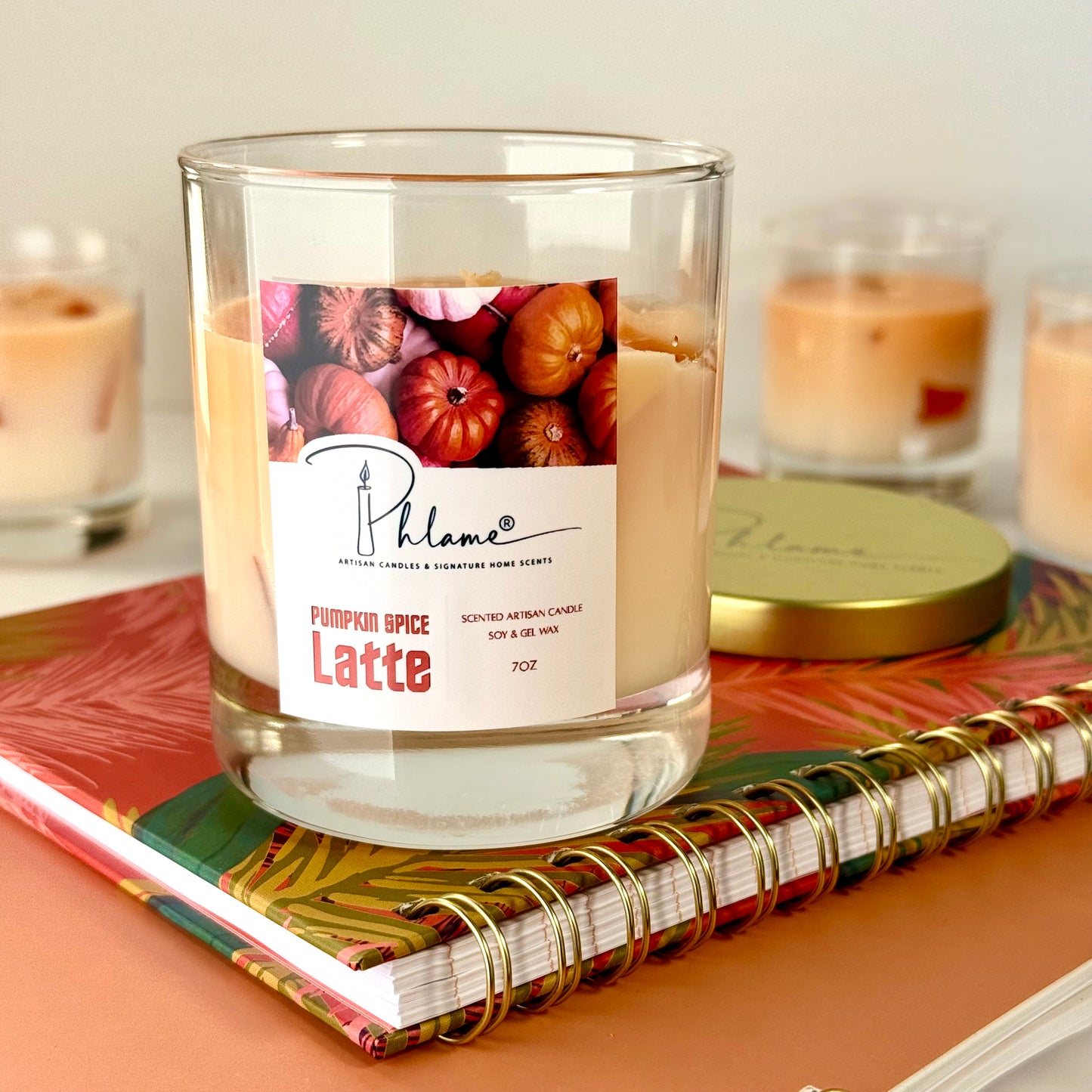 Pumpkin Spice Latte Candle with layered orange wax and gift packaging, styled for autumn ambiance