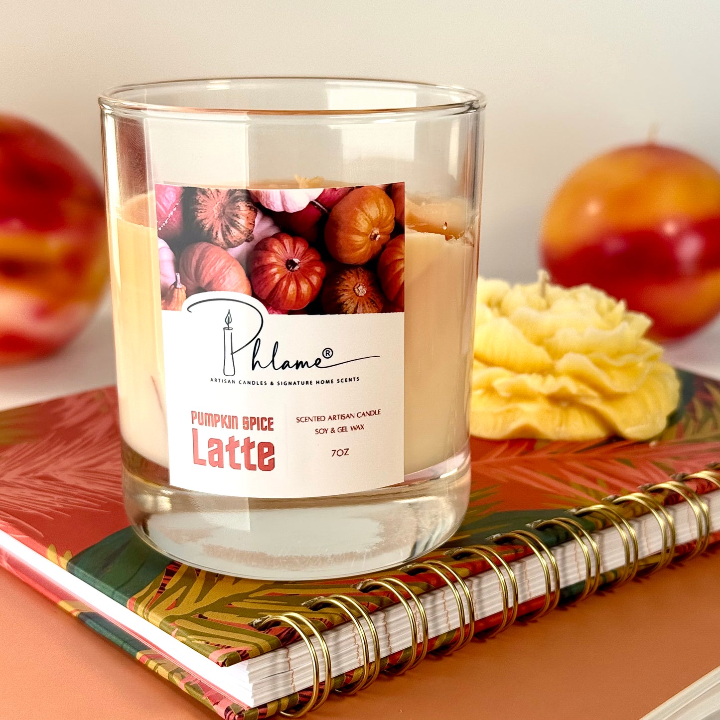 Pumpkin Spice Latte Candle with layered orange wax and gift packaging, styled for autumn ambiance