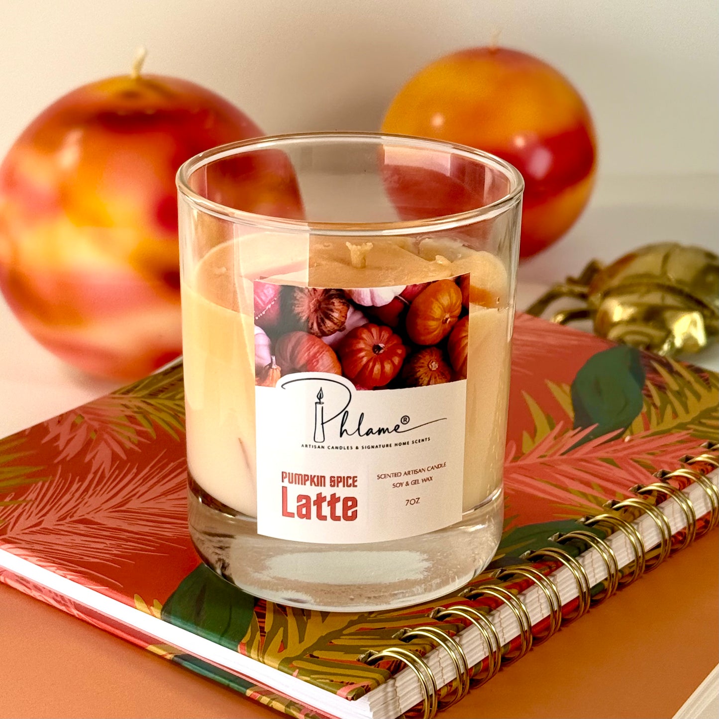 Pumpkin Spice Latte Candle with layered orange wax and gift packaging, styled for autumn ambiance
