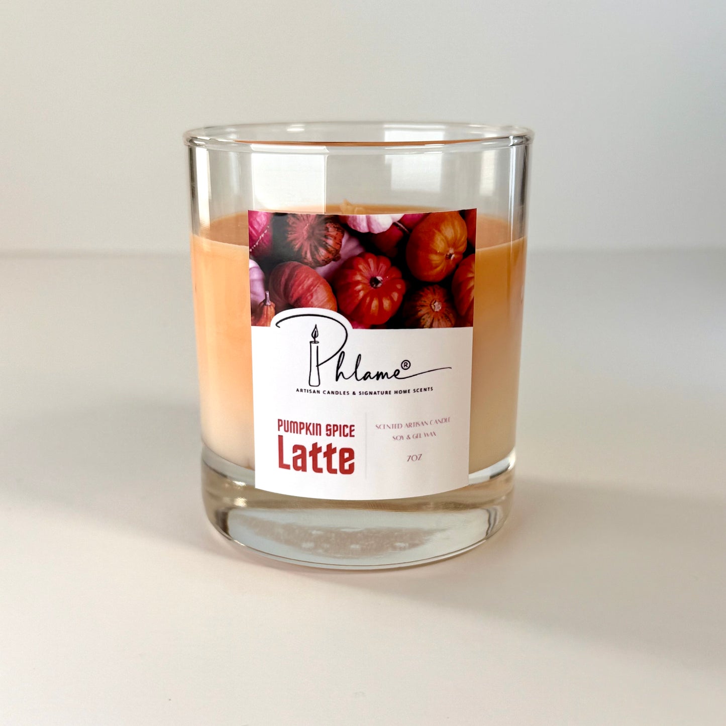 Pumpkin Spice Latte Candle with layered orange wax and gift packaging, styled for autumn ambiance