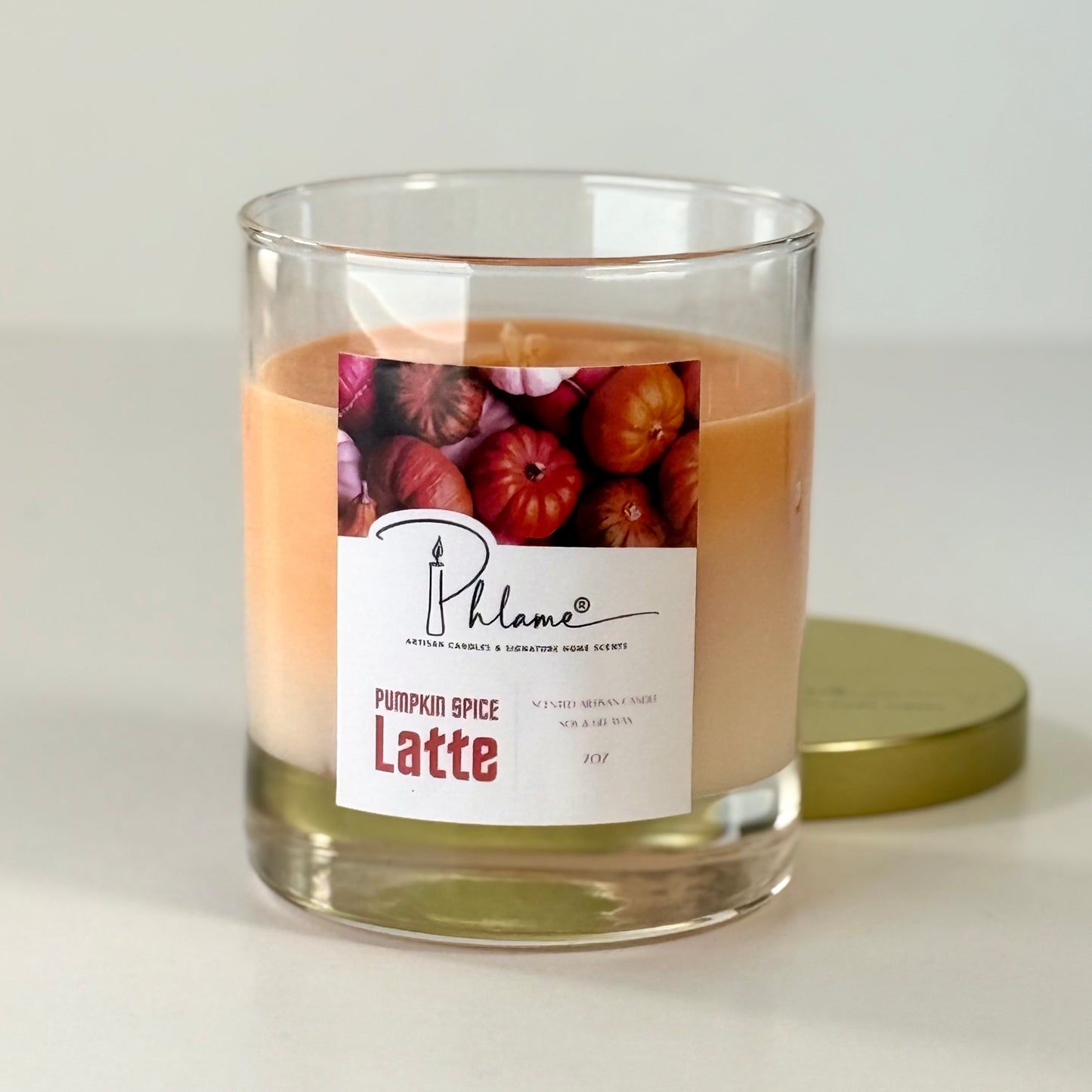 Pumpkin Spice Latte Candle with layered orange wax and gift packaging, styled for autumn ambiance