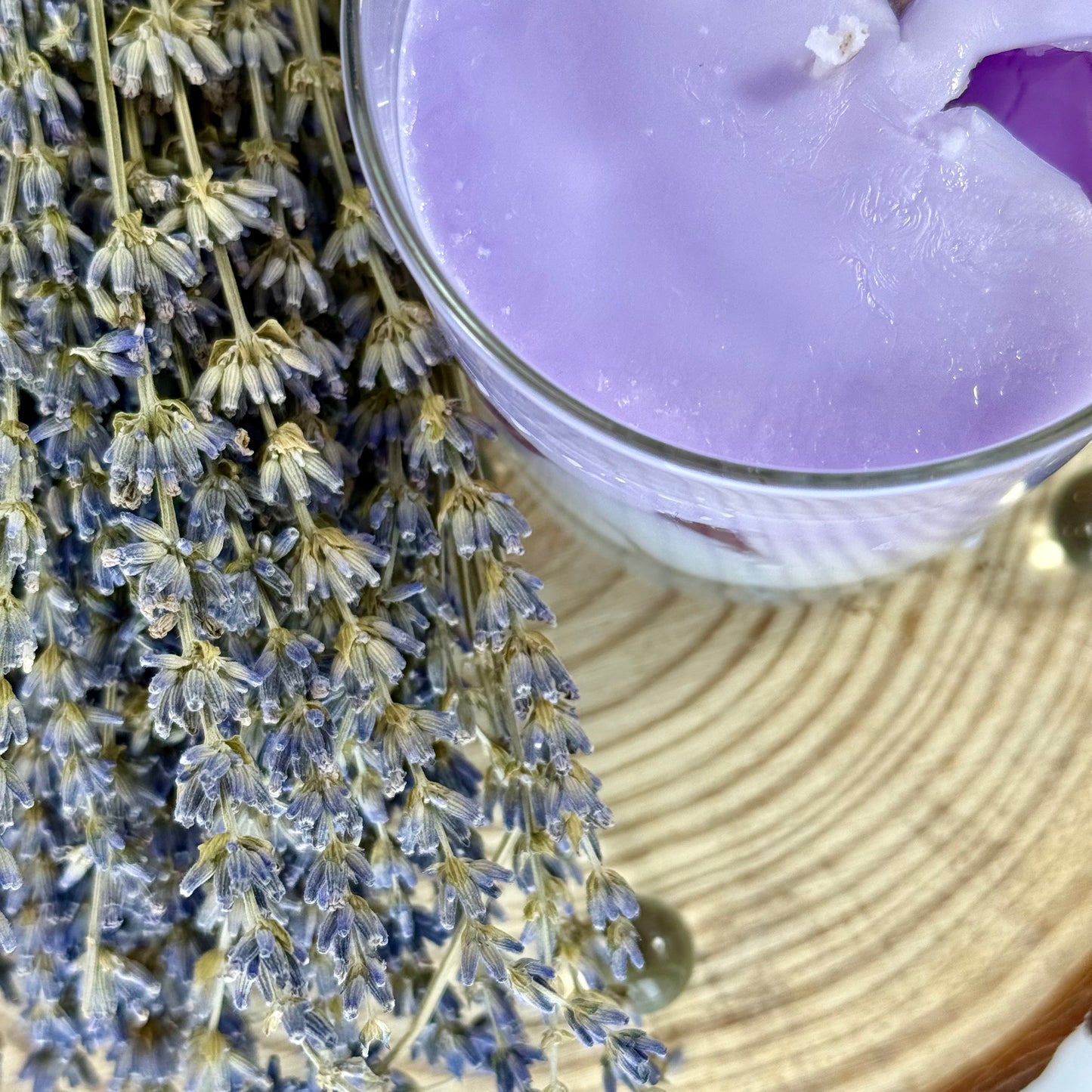 Lavender Latte Candle with layered wax in glass jar and bamboo lid, styled for gift-ready presentation