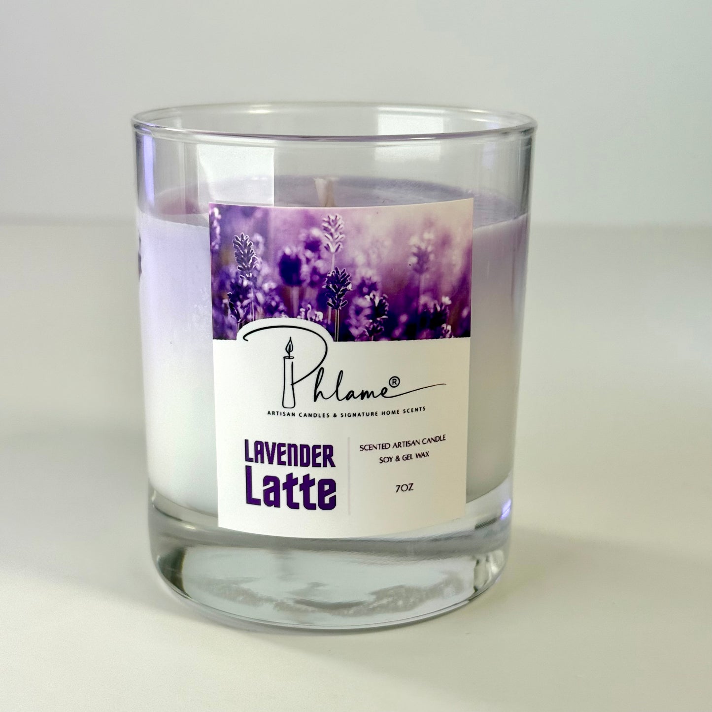 Lavender Latte Candle with layered wax in glass jar and bamboo lid, styled for gift-ready presentation