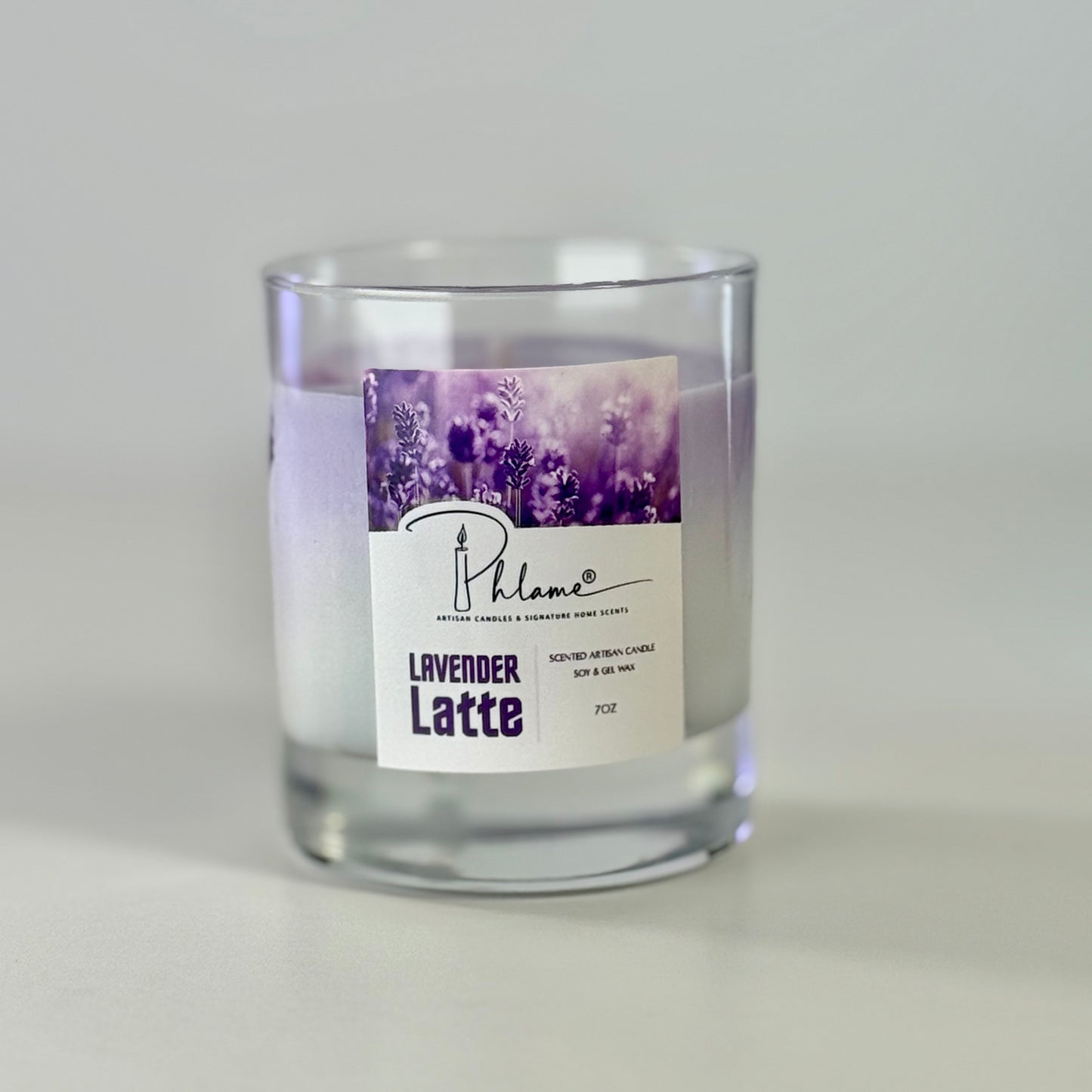 Lavender Latte Candle with layered wax in glass jar and bamboo lid, styled for gift-ready presentation