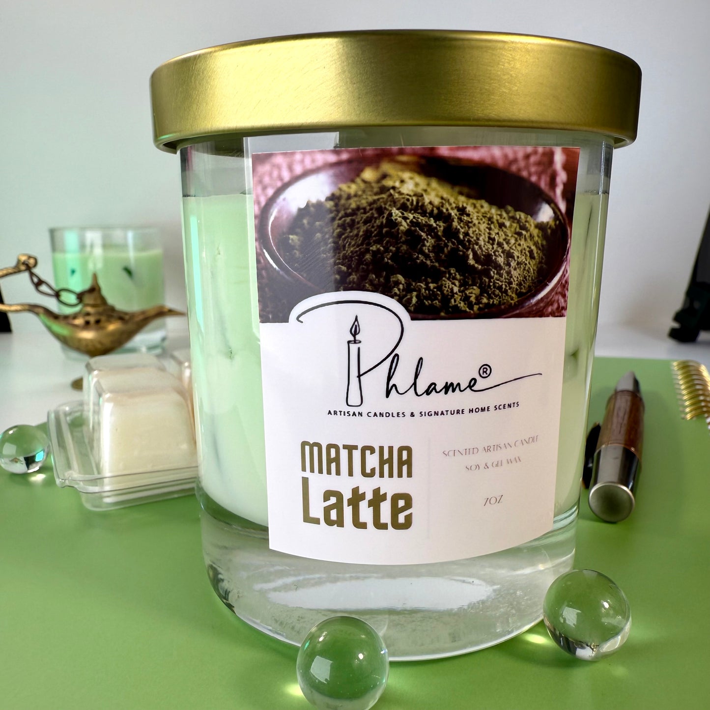 Matcha Latte Candle with green wax layers and lid, ideal for wellness and self-care gifts