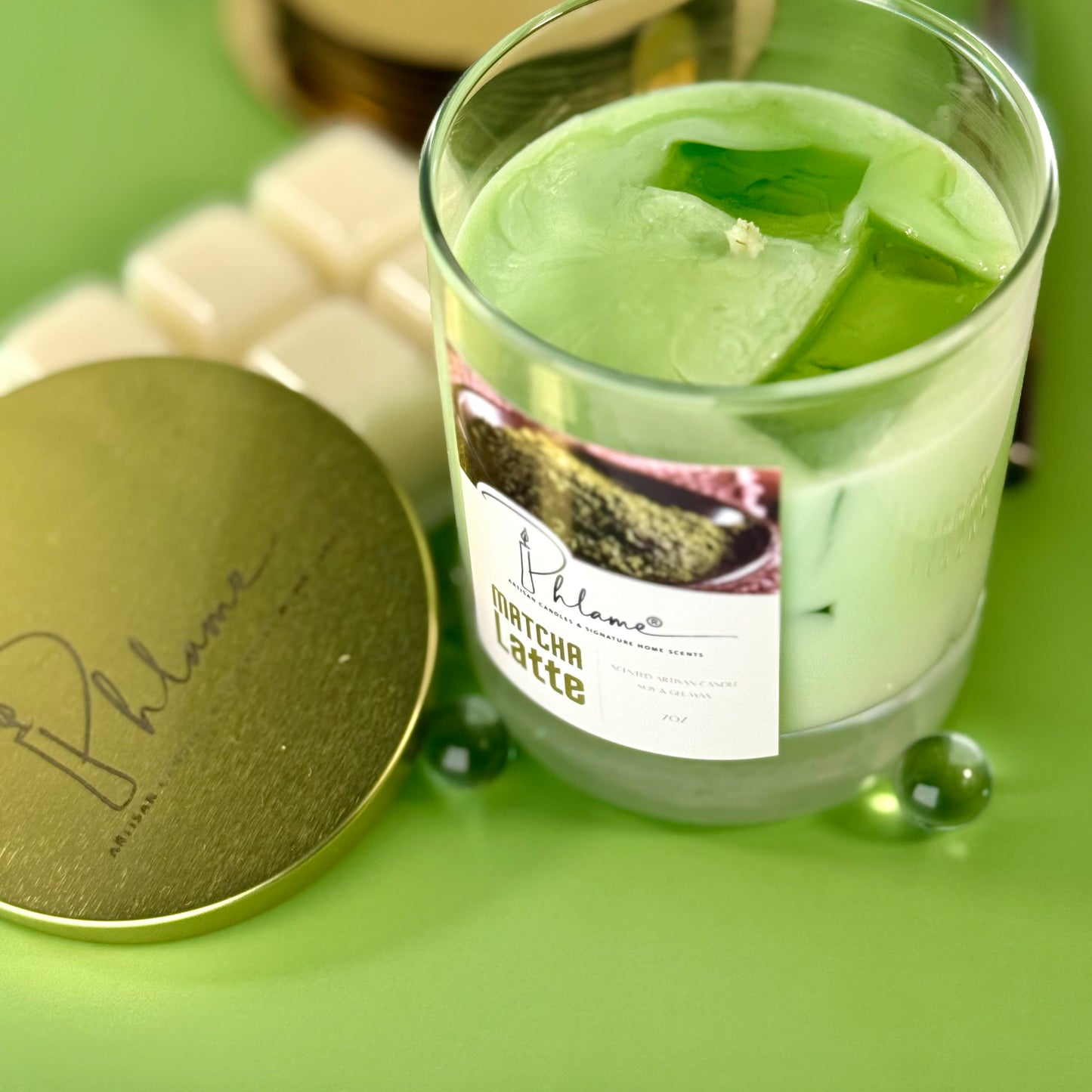 Matcha Latte Candle with green wax layers and bamboo lid, ideal for wellness and self-care gifts