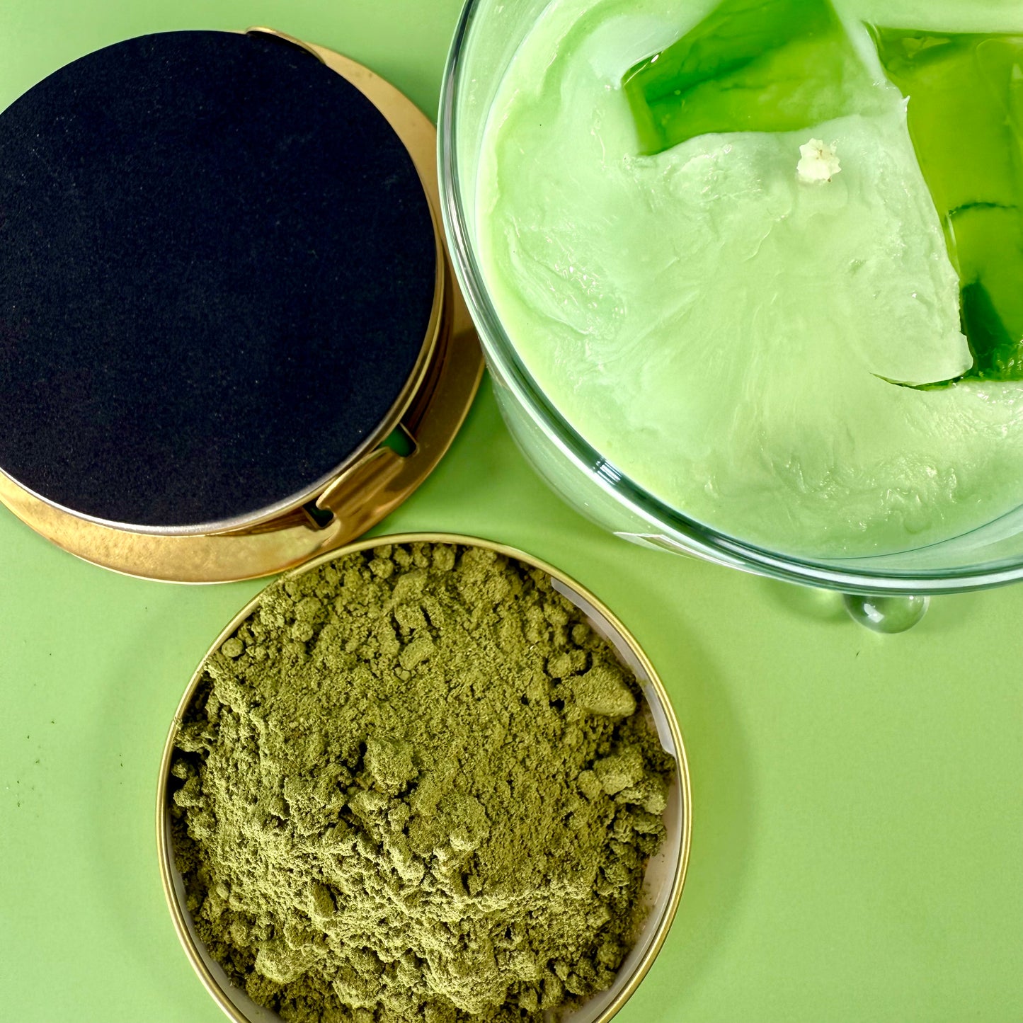 Matcha Latte Candle with green wax layers and lid, ideal for wellness and self-care gifts