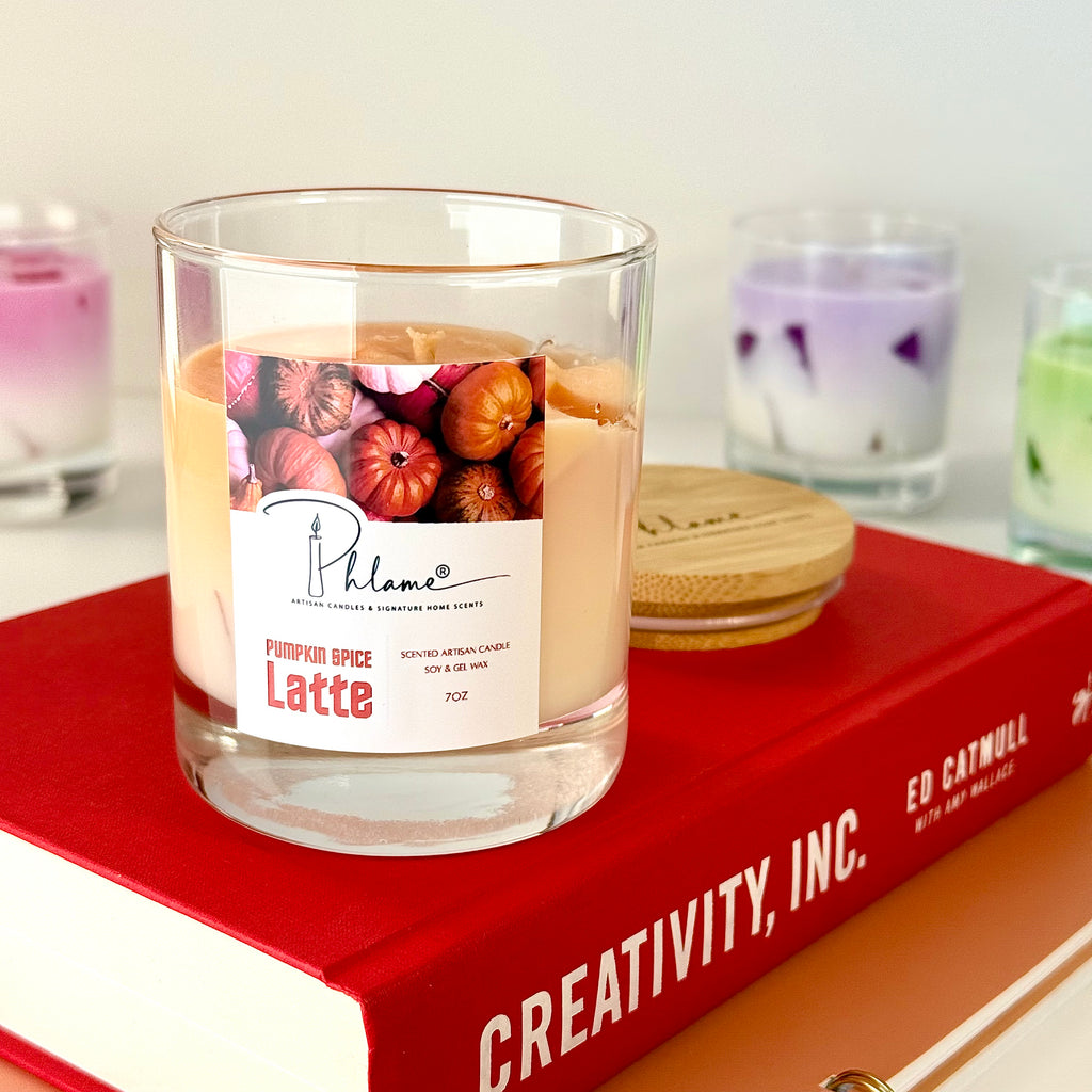 Pumpkin Spice Latte Candle with layered orange wax and gift packaging, styled for autumn ambiance