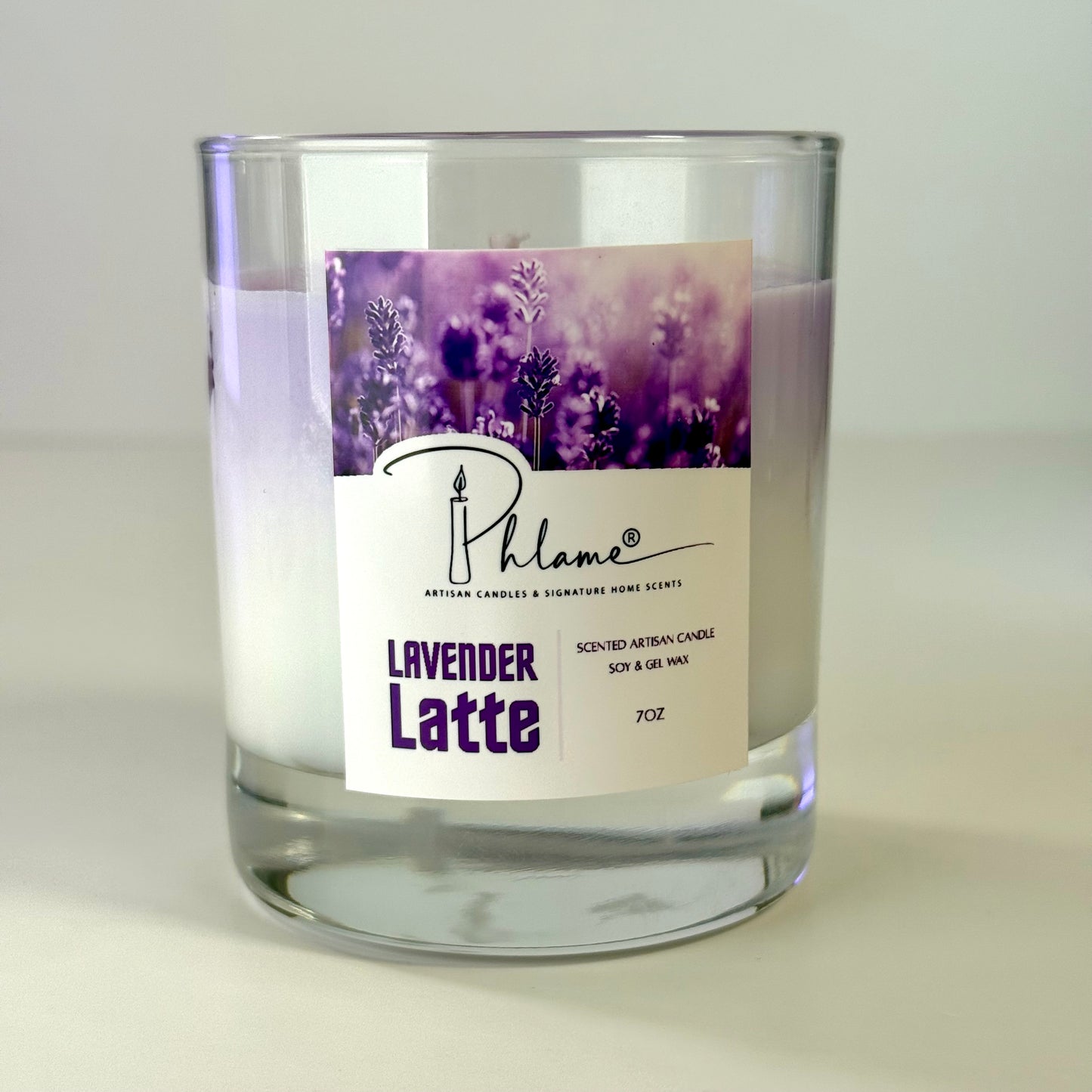 Lavender Latte Candle with layered wax in glass jar and bamboo lid, styled for gift-ready presentation