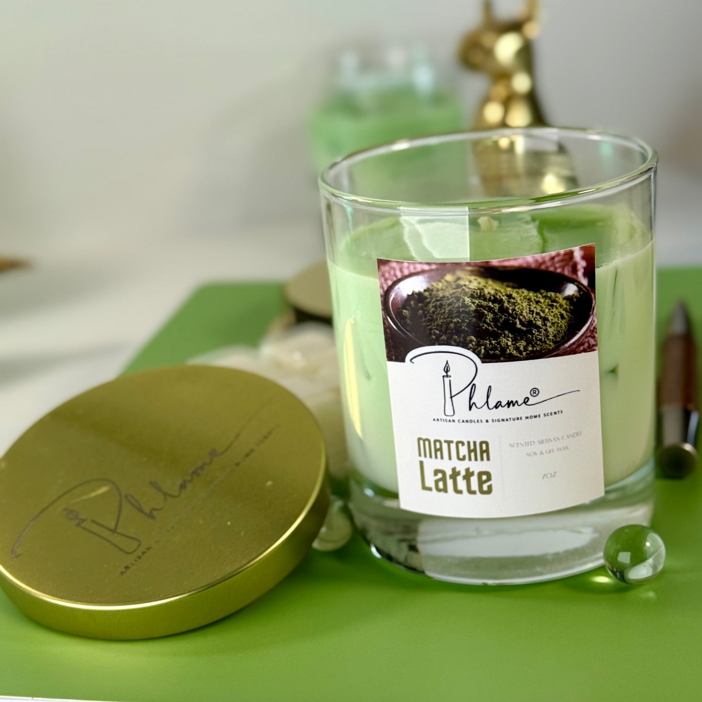 Matcha Latte Candle with green wax layers and lid, ideal for wellness and self-care gifts