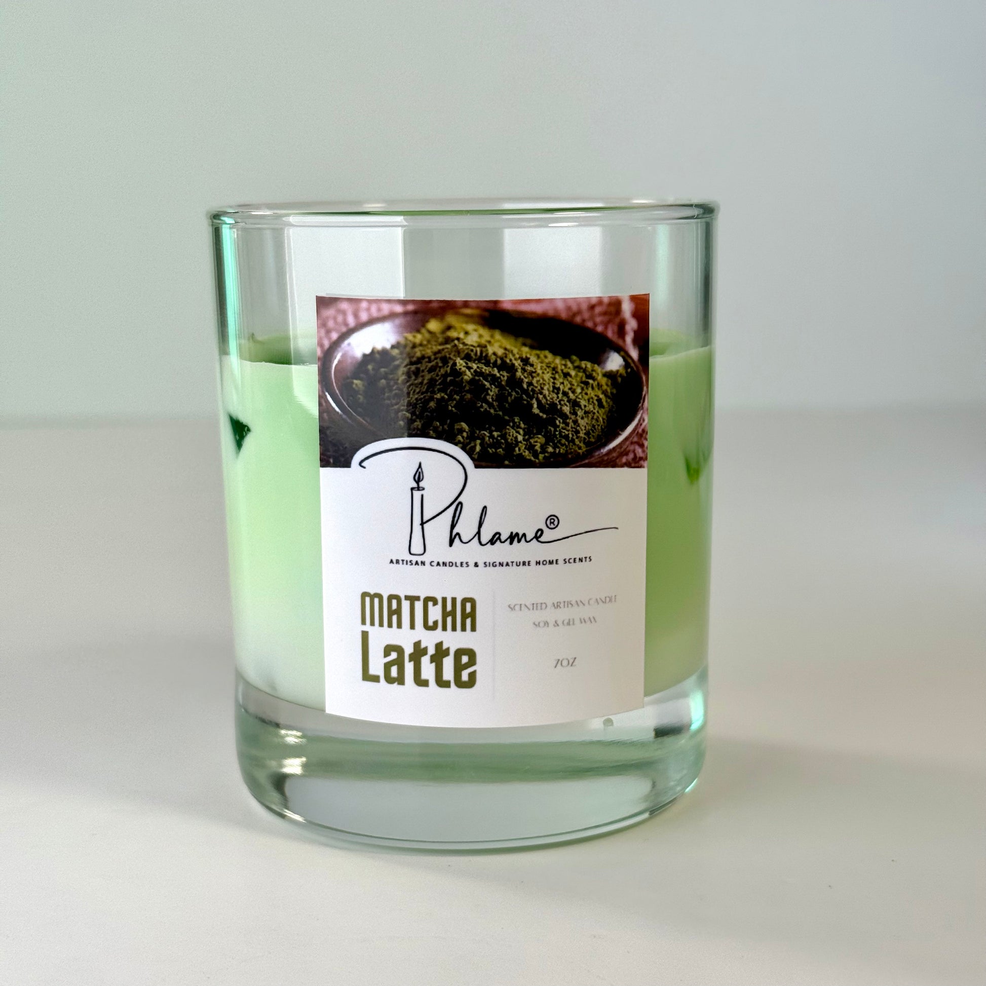 Matcha Latte Candle with green wax layers and lid, ideal for wellness and self-care gifts
