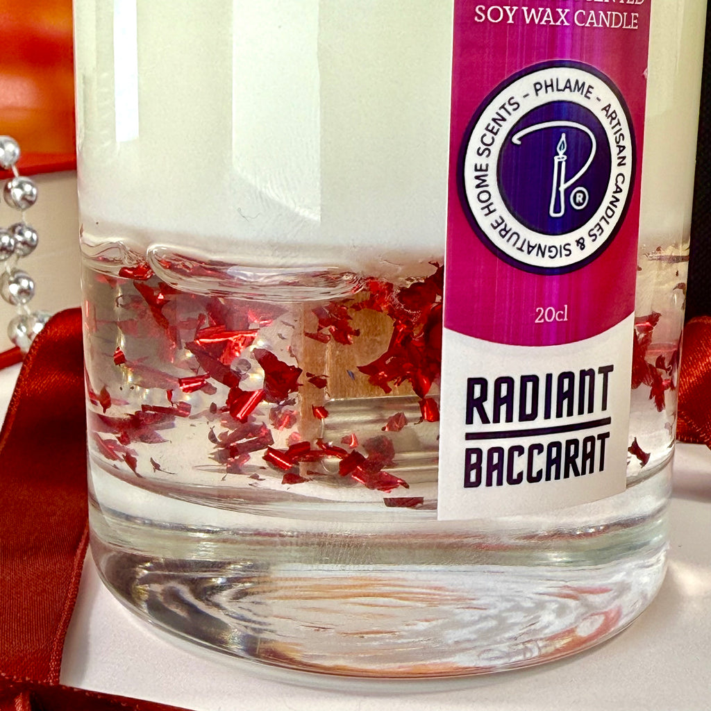 Radiant Baccarat candle with red gel wax and elegant black box, styled for luxury.