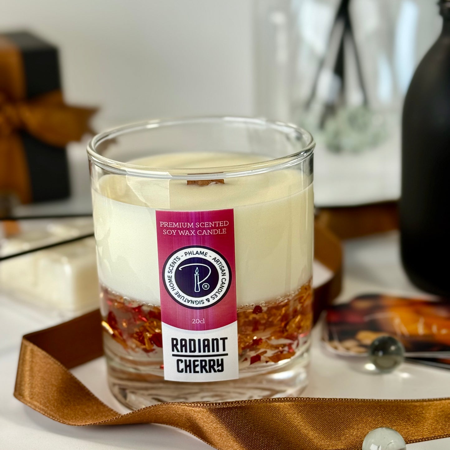 Radiant Cherry candle with shimmering red wax and gift-ready presentation