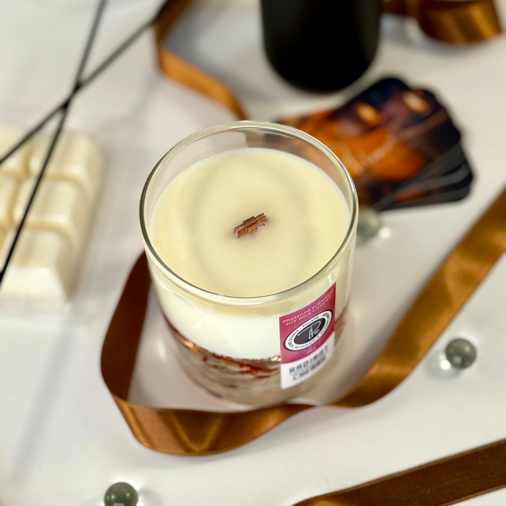 Radiant Cherry candle with shimmering red wax and gift-ready presentation.